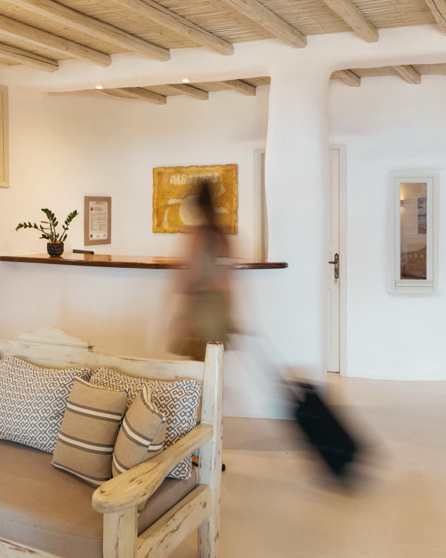 woman walking in the hotel reception